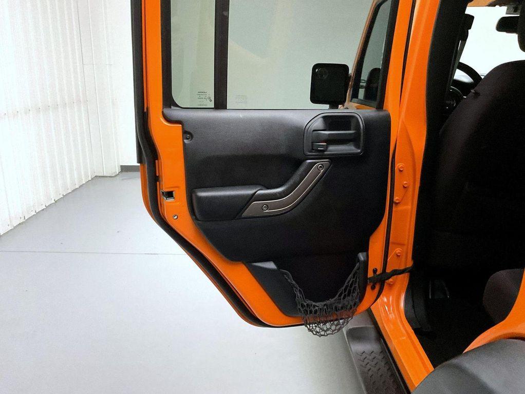 used 2013 Jeep Wrangler Unlimited car, priced at $17,655