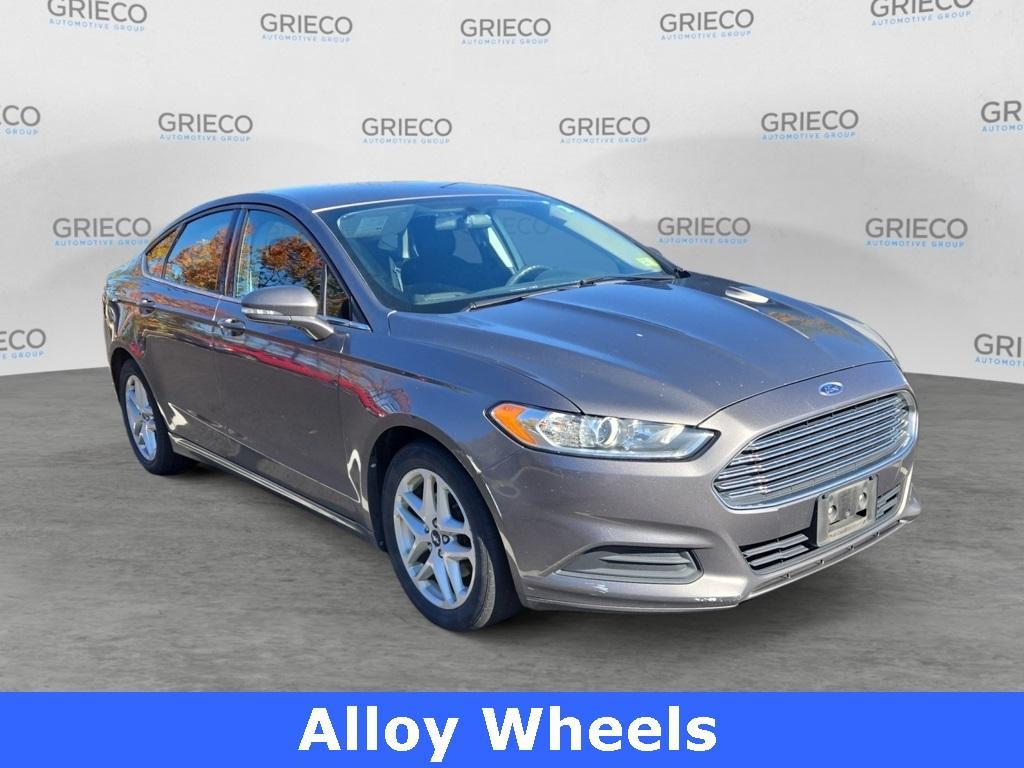used 2014 Ford Fusion car, priced at $6,795