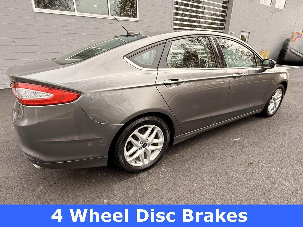 used 2014 Ford Fusion car, priced at $6,717
