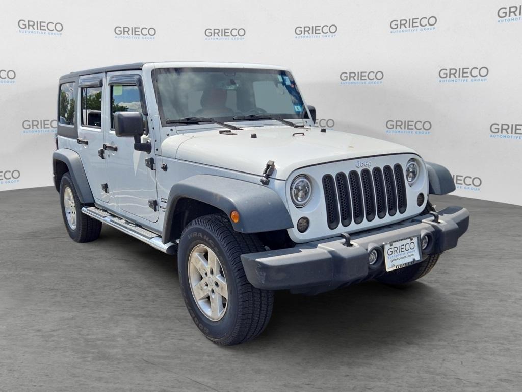 used 2014 Jeep Wrangler Unlimited car, priced at $12,804