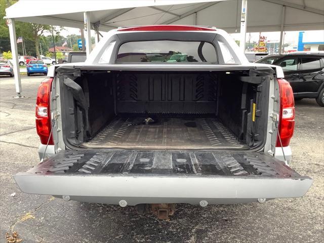 used 2013 Chevrolet Avalanche car, priced at $13,978