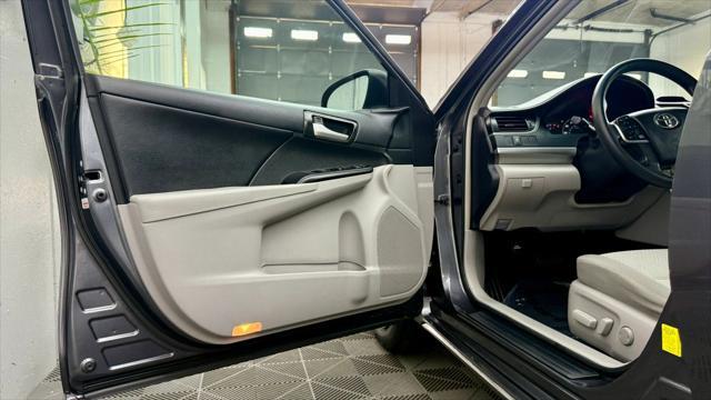 used 2014 Toyota Camry car, priced at $12,400