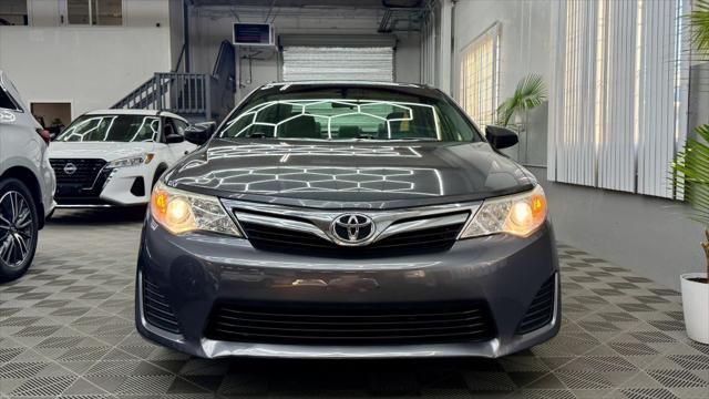 used 2014 Toyota Camry car, priced at $12,400