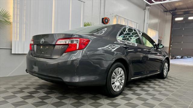 used 2014 Toyota Camry car, priced at $12,400