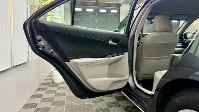 used 2014 Toyota Camry car, priced at $12,400