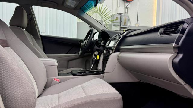 used 2014 Toyota Camry car, priced at $12,400