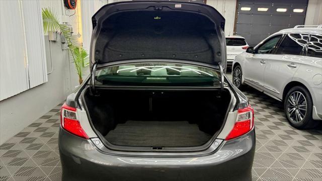 used 2014 Toyota Camry car, priced at $12,400