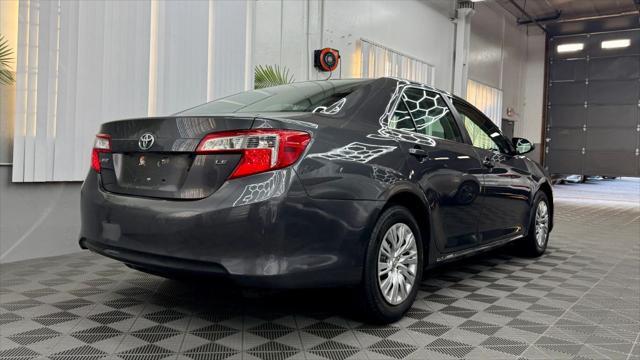 used 2014 Toyota Camry car, priced at $12,400