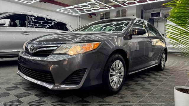 used 2014 Toyota Camry car, priced at $12,400