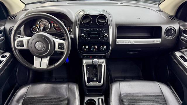used 2016 Jeep Compass car, priced at $9,999