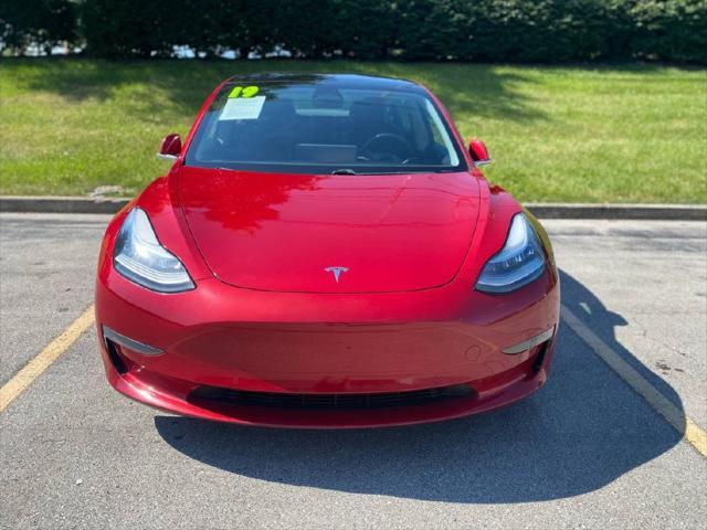 used 2019 Tesla Model 3 car, priced at $14,900