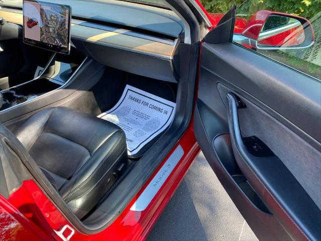 used 2019 Tesla Model 3 car, priced at $14,900