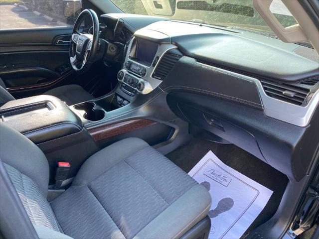 used 2015 GMC Yukon car, priced at $14,900