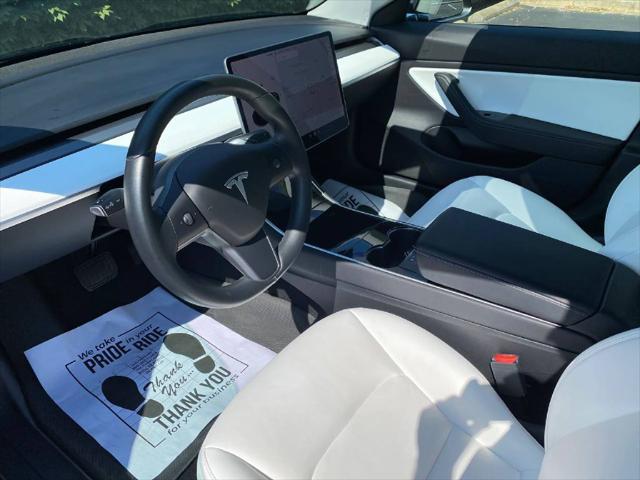 used 2019 Tesla Model 3 car, priced at $15,900