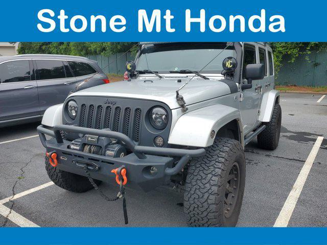 used 2012 Jeep Wrangler Unlimited car, priced at $14,339