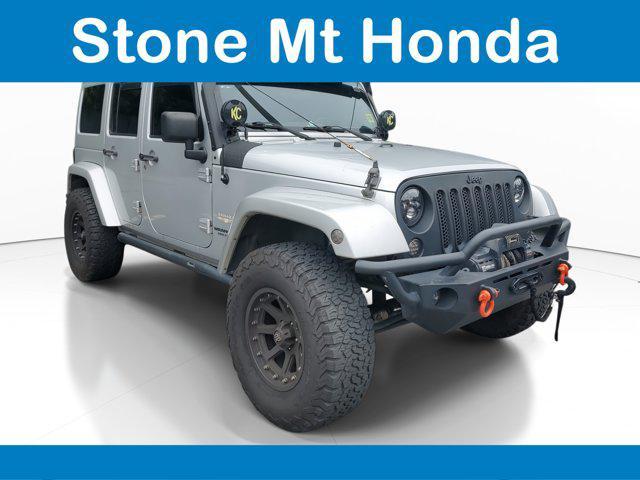 used 2012 Jeep Wrangler Unlimited car, priced at $13,884