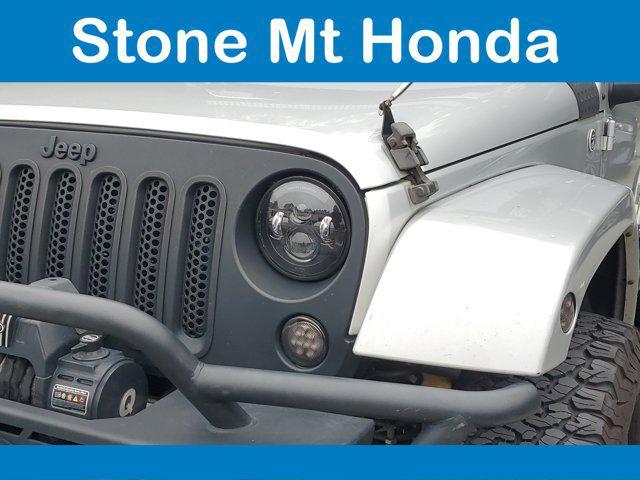 used 2012 Jeep Wrangler Unlimited car, priced at $14,339