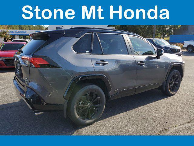 used 2022 Toyota RAV4 Hybrid car, priced at $29,499