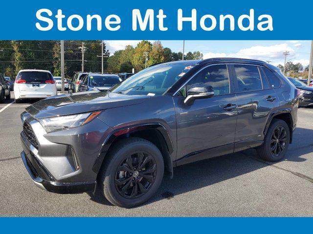 used 2022 Toyota RAV4 Hybrid car, priced at $29,499