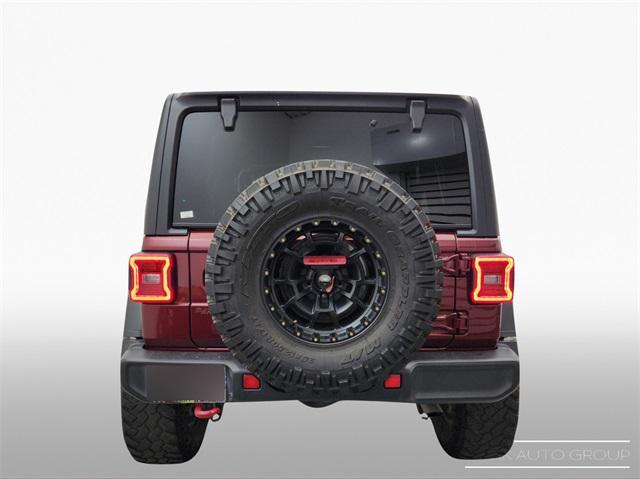 used 2021 Jeep Wrangler Unlimited car, priced at $34,394