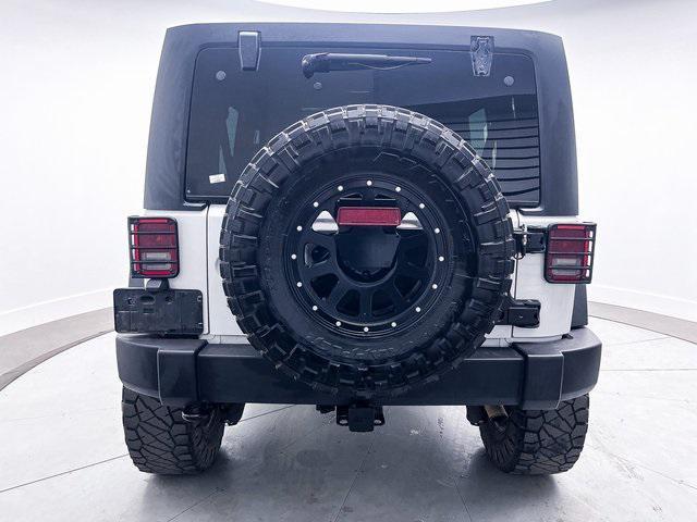 used 2013 Jeep Wrangler Unlimited car, priced at $14,899