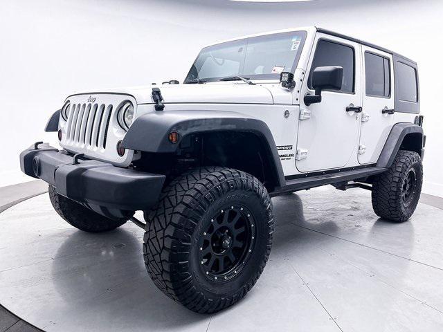 used 2013 Jeep Wrangler Unlimited car, priced at $14,899