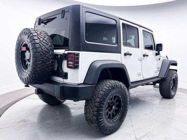 used 2013 Jeep Wrangler Unlimited car, priced at $14,899