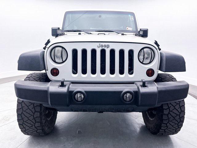 used 2013 Jeep Wrangler Unlimited car, priced at $14,899