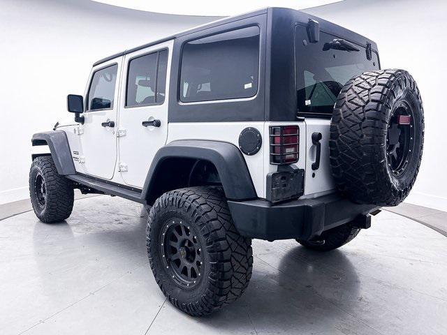 used 2013 Jeep Wrangler Unlimited car, priced at $14,899