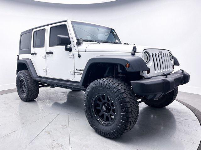 used 2013 Jeep Wrangler Unlimited car, priced at $14,899