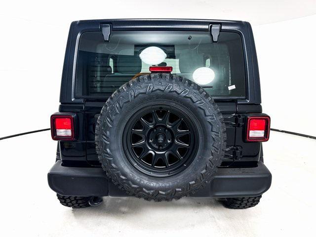 used 2021 Jeep Wrangler car, priced at $27,500