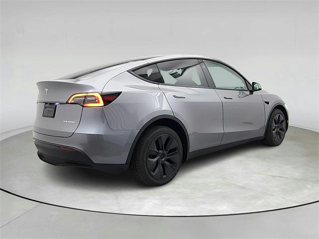 used 2025 Tesla Model Y car, priced at $39,991