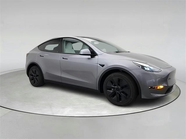 used 2025 Tesla Model Y car, priced at $39,991