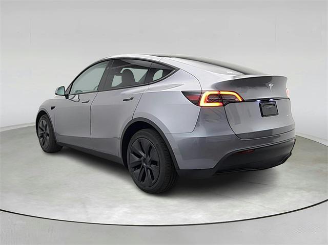 used 2025 Tesla Model Y car, priced at $39,991