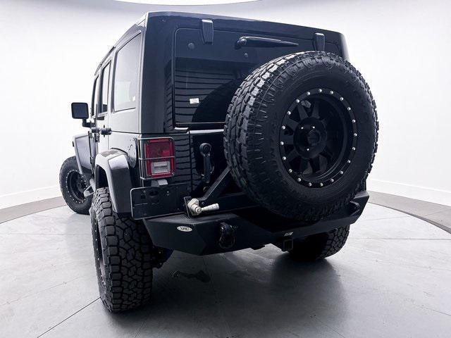 used 2014 Jeep Wrangler Unlimited car, priced at $24,891