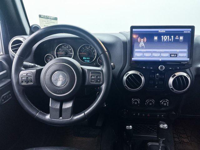 used 2014 Jeep Wrangler Unlimited car, priced at $24,891