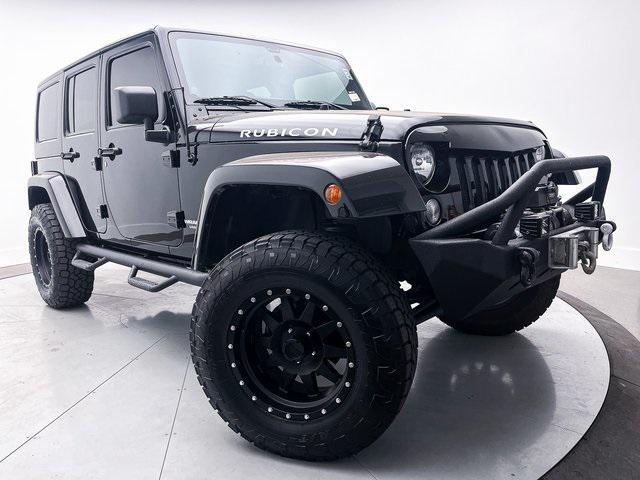 used 2014 Jeep Wrangler Unlimited car, priced at $24,891