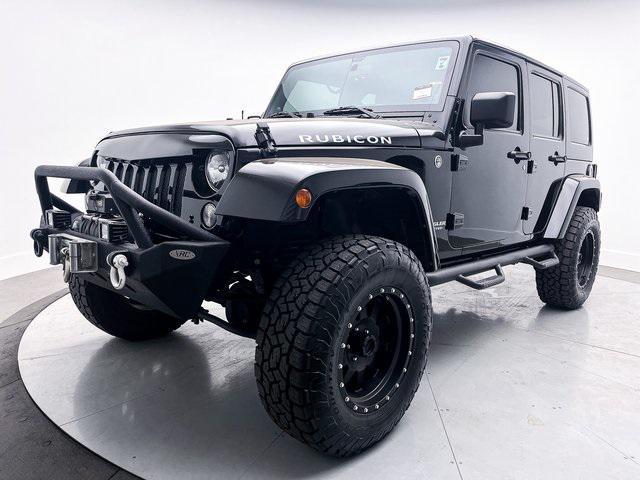 used 2014 Jeep Wrangler Unlimited car, priced at $24,891