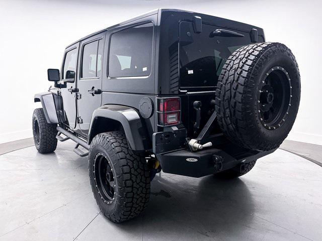 used 2014 Jeep Wrangler Unlimited car, priced at $24,891