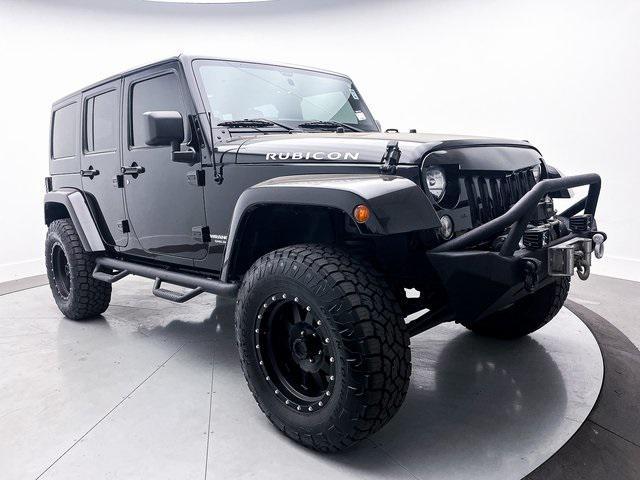 used 2014 Jeep Wrangler Unlimited car, priced at $24,891