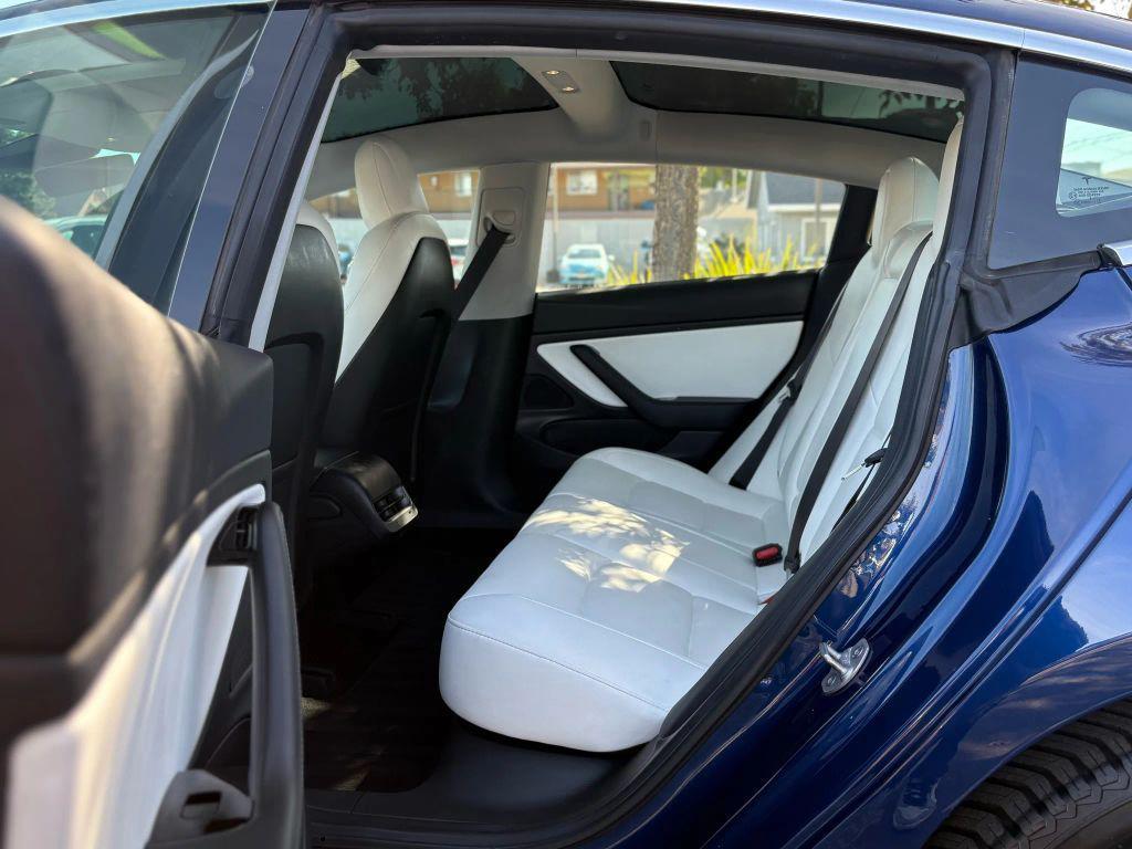 used 2018 Tesla Model 3 car, priced at $16,999