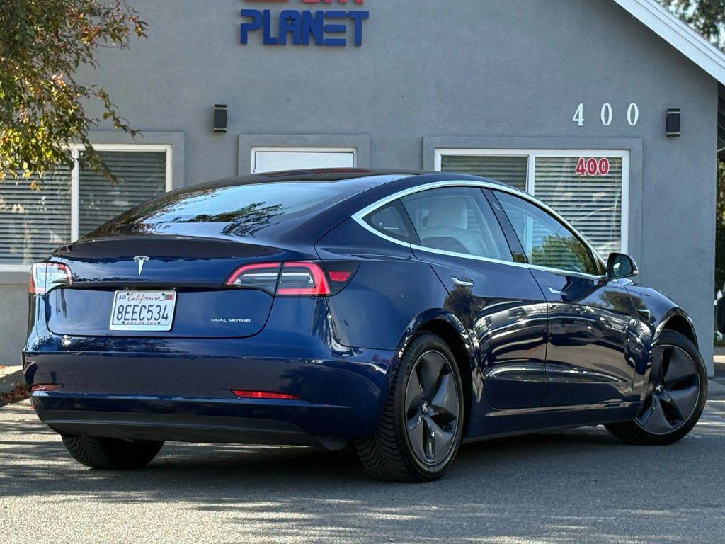 used 2018 Tesla Model 3 car, priced at $16,999