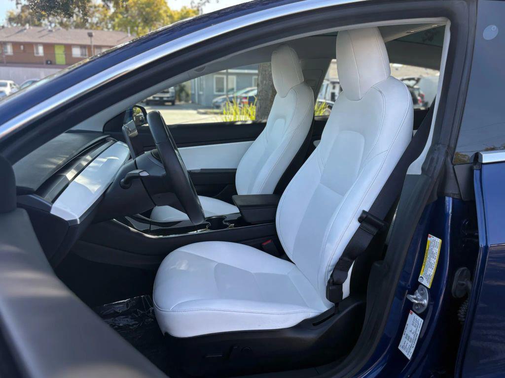 used 2018 Tesla Model 3 car, priced at $16,999
