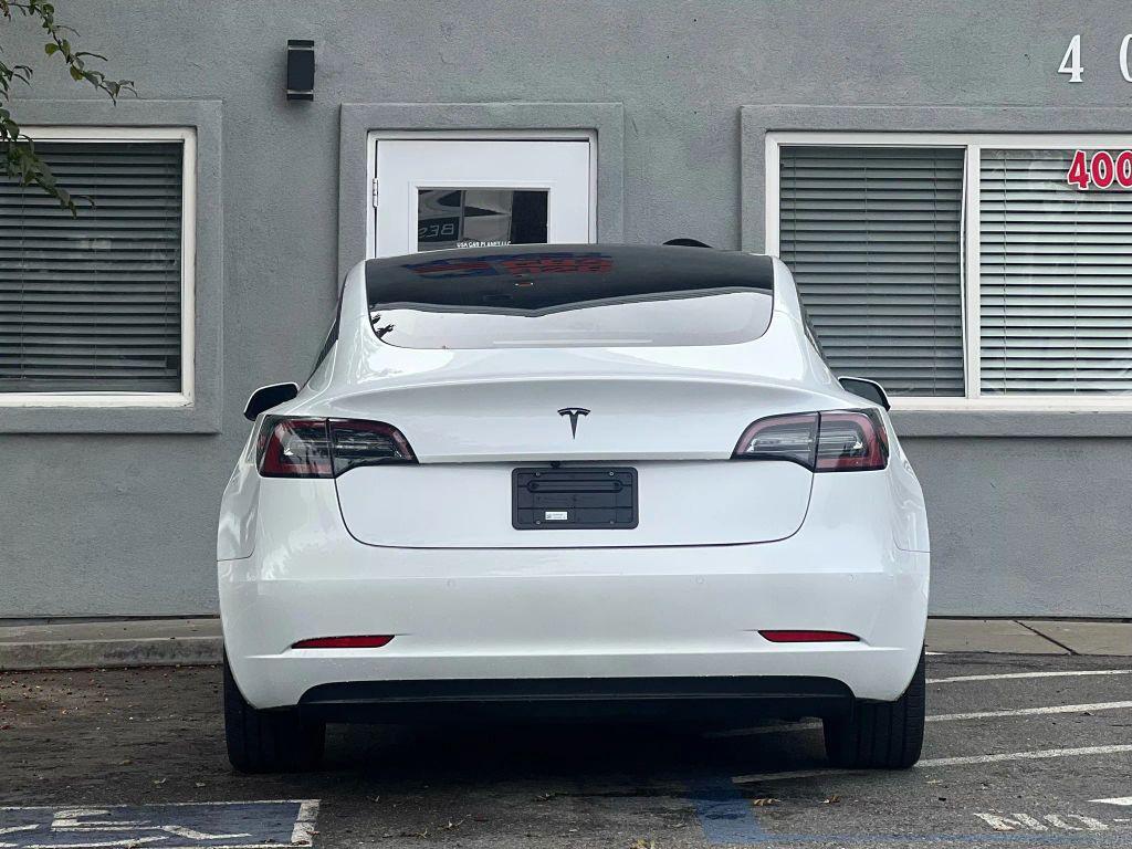 used 2021 Tesla Model 3 car, priced at $18,999