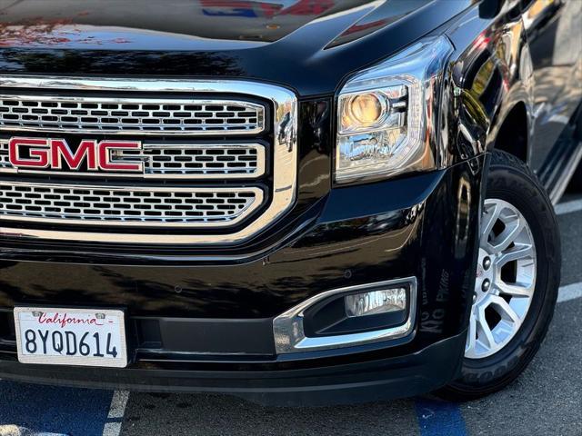 used 2015 GMC Yukon car, priced at $19,299