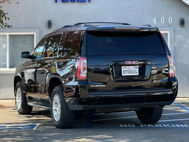 used 2015 GMC Yukon car, priced at $19,299