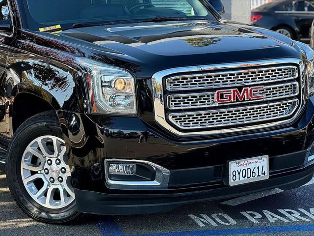 used 2015 GMC Yukon car, priced at $19,299