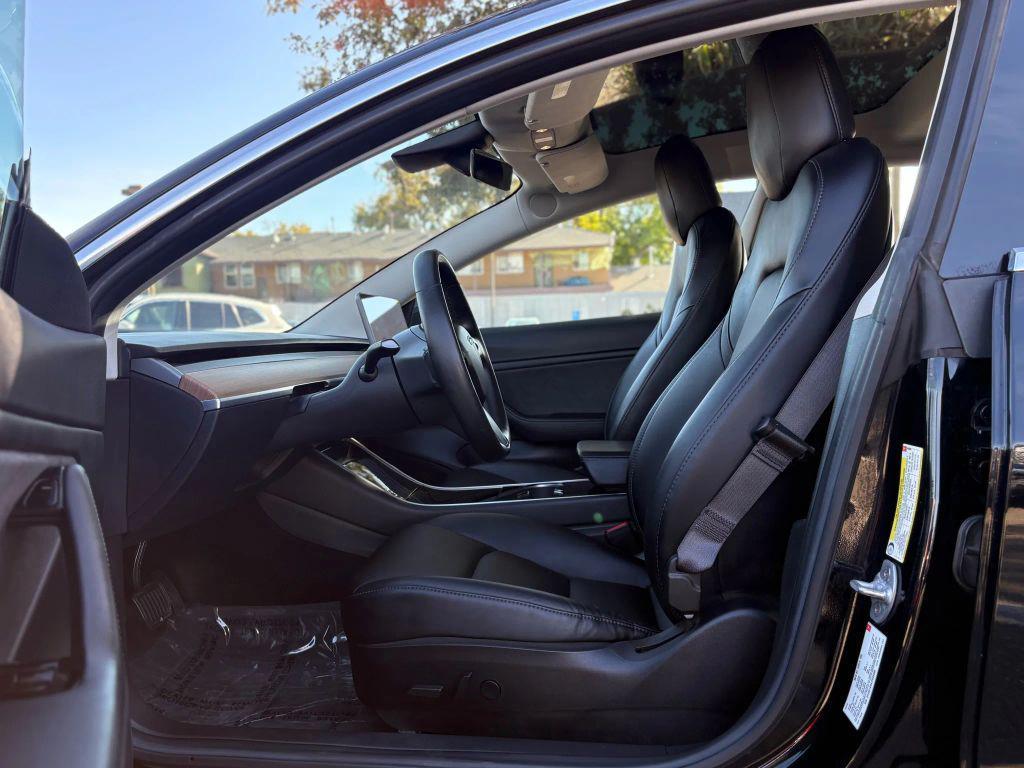 used 2018 Tesla Model 3 car, priced at $14,999