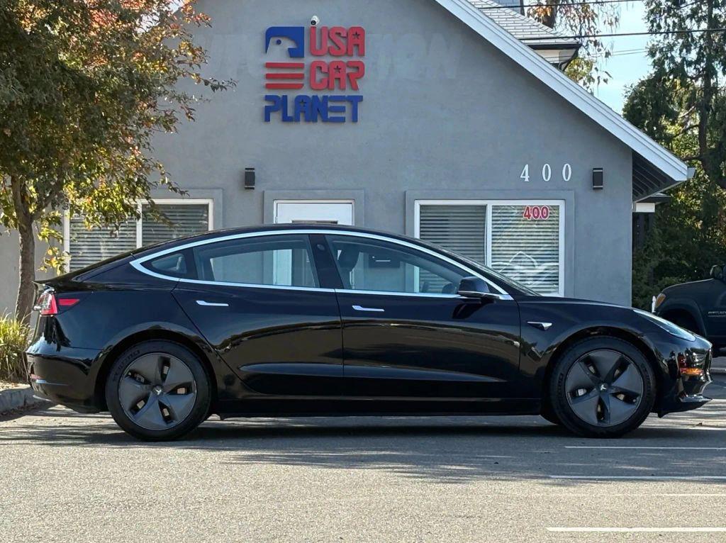 used 2018 Tesla Model 3 car, priced at $14,999