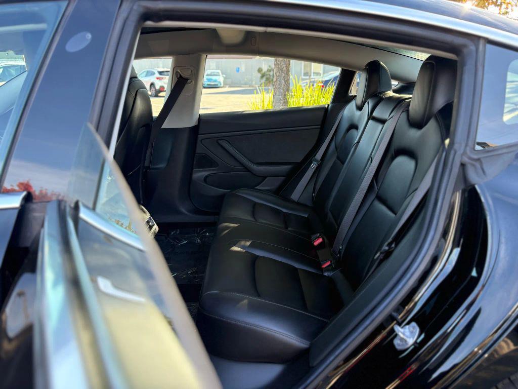 used 2018 Tesla Model 3 car, priced at $14,999